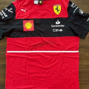 Red and black Ferrari racing team shirt with sponsors.