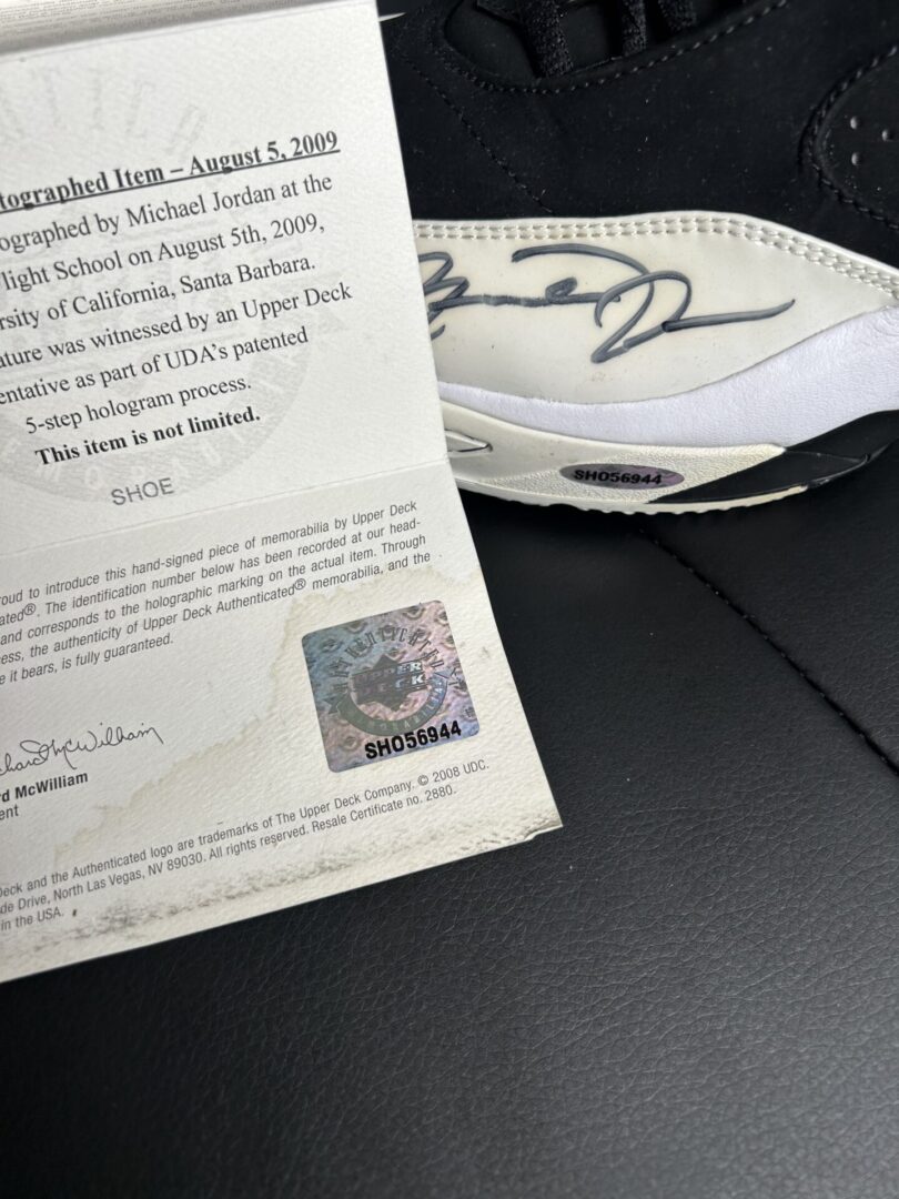 Autographed shoe with certificate of authenticity.