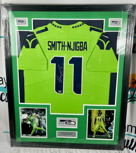 Framed green football jersey with the name Smith-Njigba and number 11.