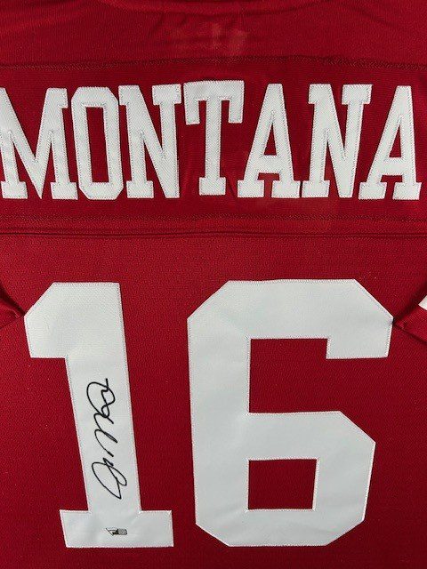 Close-up of a red sports jersey with 'MONTANA' and number 16.