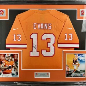 Framed orange football jersey with number 13 and name Evans.