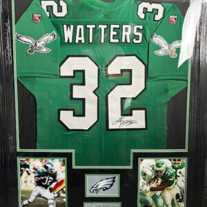 Framed green football jersey with action photos.