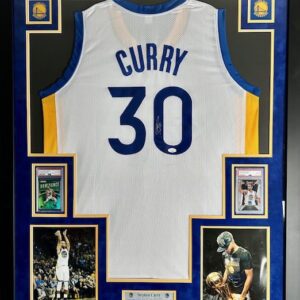 Framed Stephen Curry jersey with memorabilia.