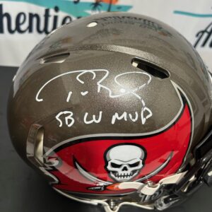 A signed Tampa Bay Buccaneers helmet with 'SB LV MVP' inscription.