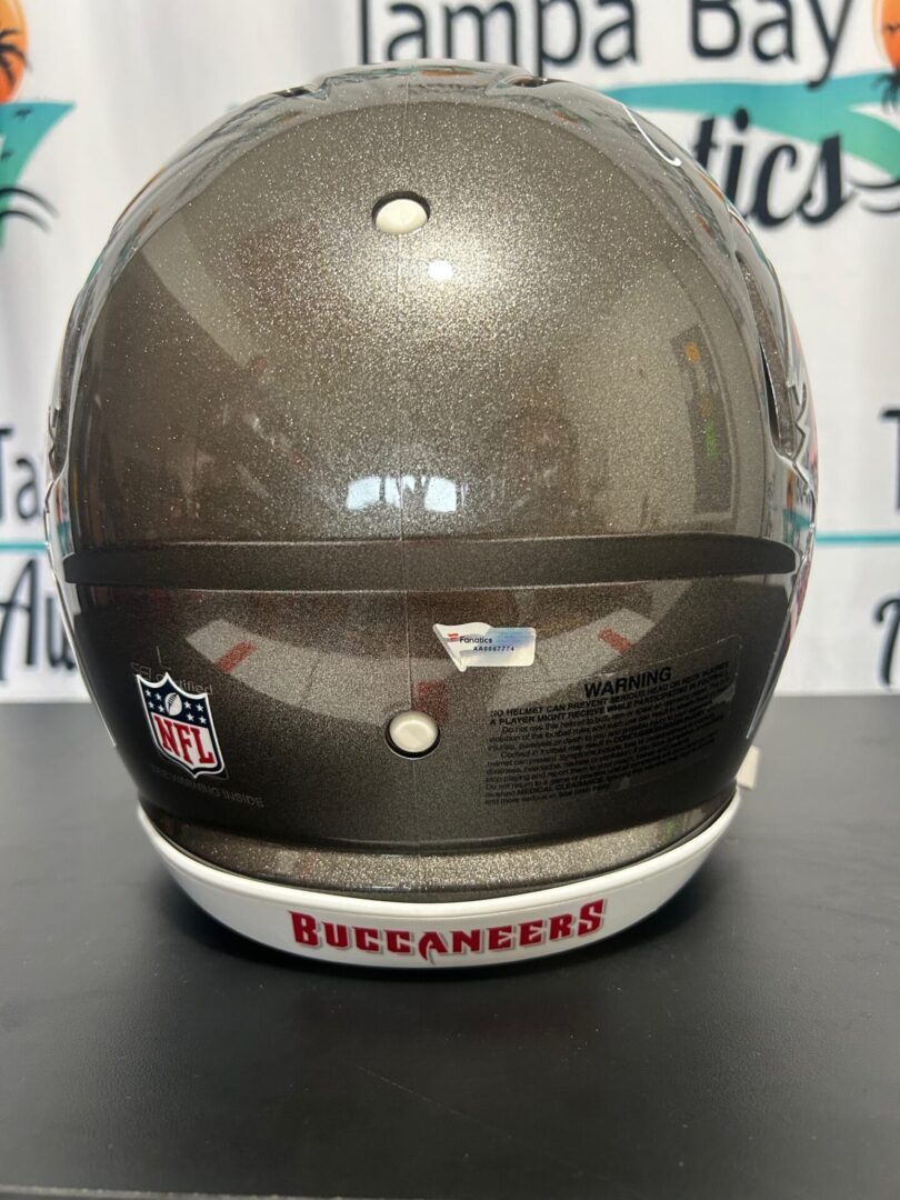 Back view of a Buccaneers football helmet.