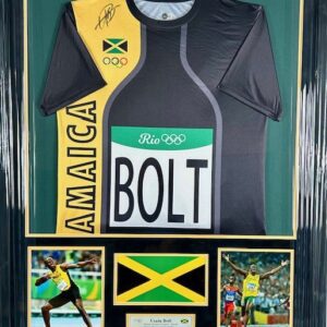 A Usain Bolt Jamaica track jersey with memorabilia.