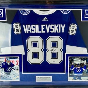 A framed hockey jersey of Vasilevskiy with number 88.
