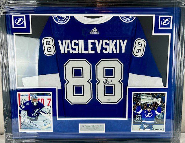 A framed hockey jersey of Vasilevskiy with number 88.