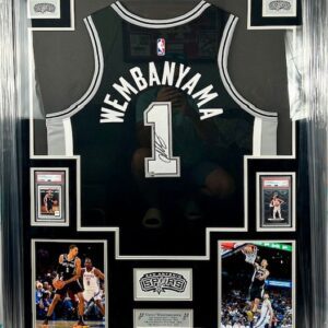 A framed black basketball jersey with the name 'Membanyah' and number 1.