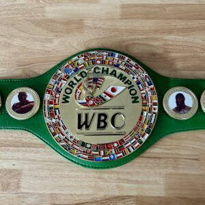 WBC World Champion boxing belt on table.