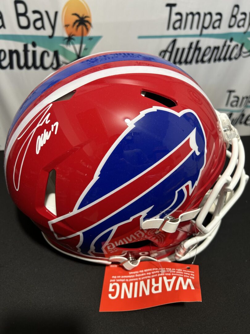 Red football helmet with buffalo logo.