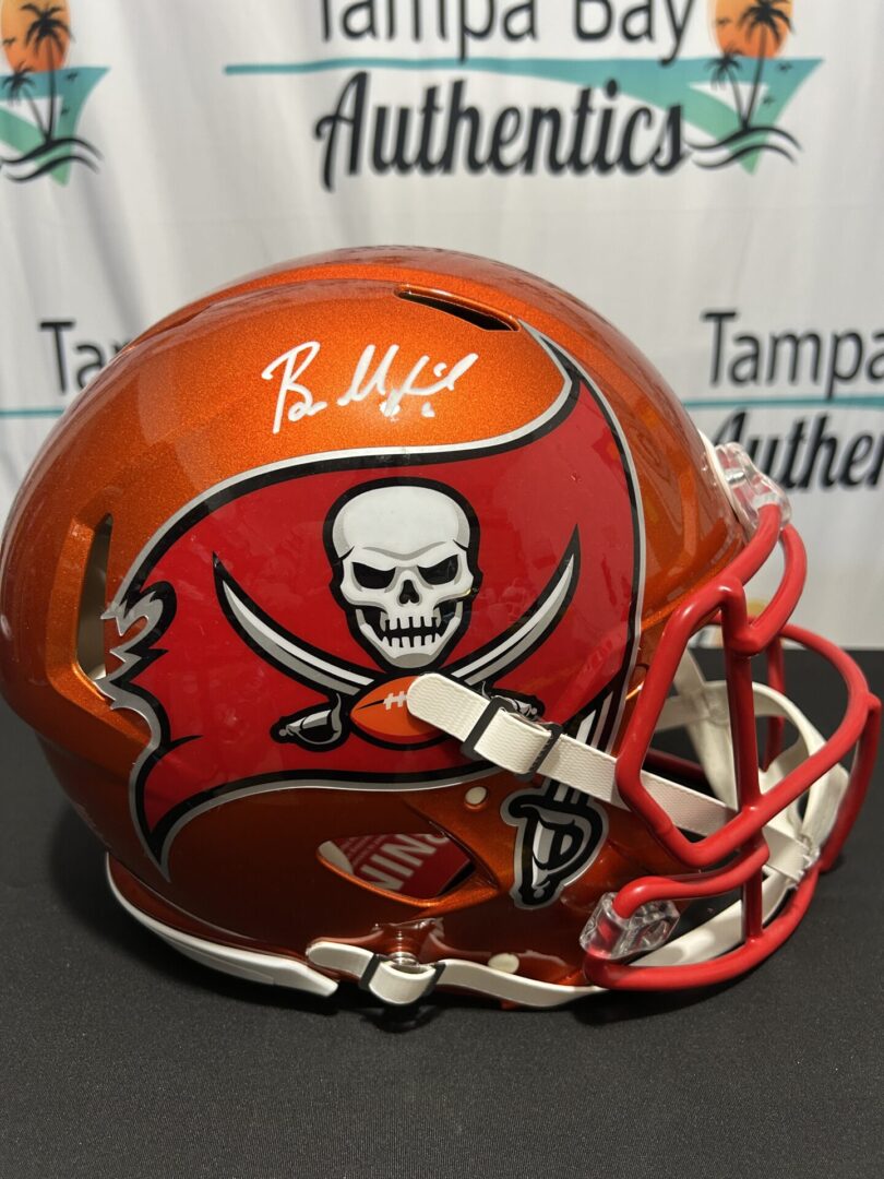 Signed Tampa Bay Buccaneers football helmet.