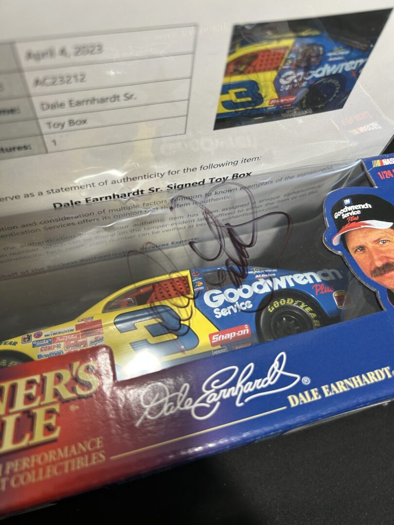 Signed Dale Earnhardt collectible toy car.