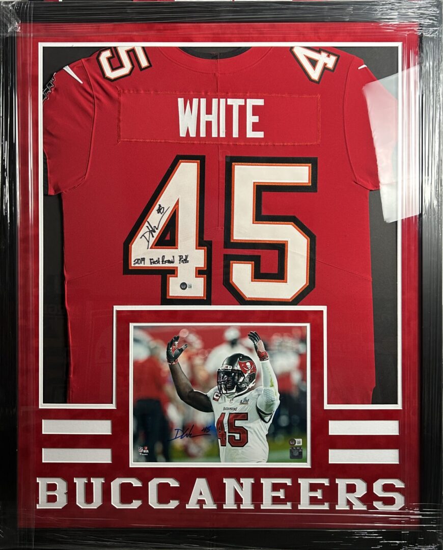 Signed Buccaneers jersey with player photo.