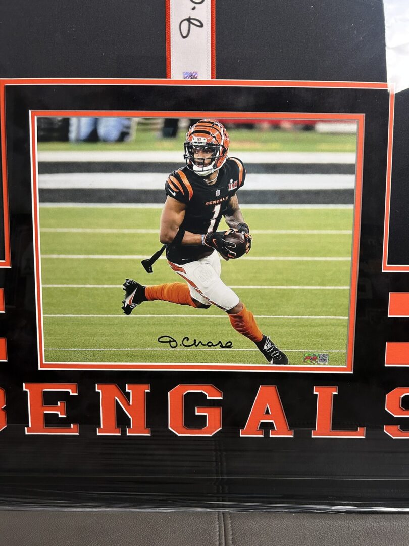 Framed Bengals player action photograph