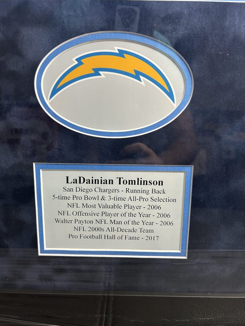 Plaque honoring LaDainian Tomlinson's football achievements.