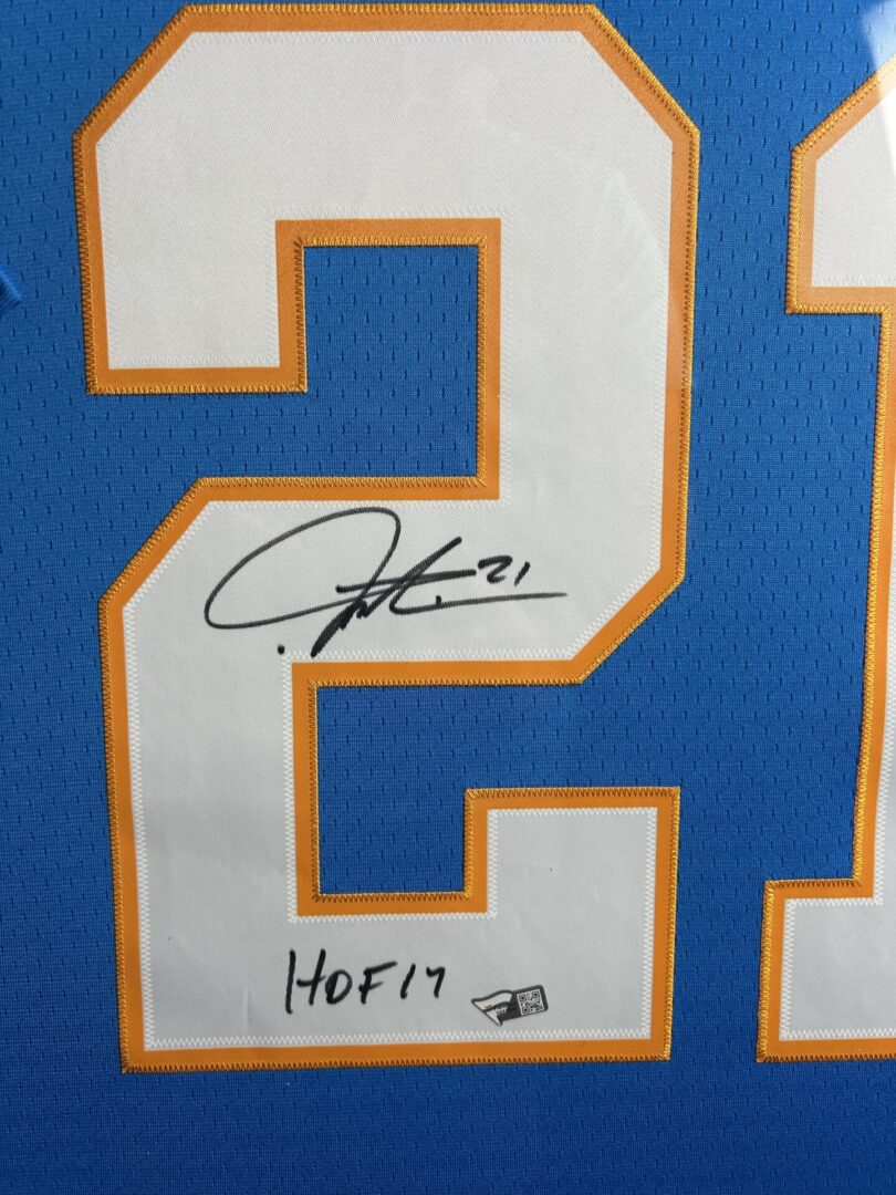 Signed sports jersey with number 21.