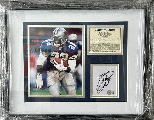 Framed football action photo with autograph